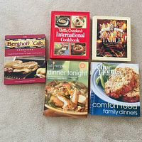 Group shot of all 5 hardcover cookbooks