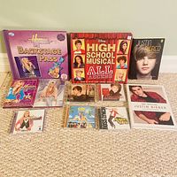 All items laid out showing books, DVDs and CDs together