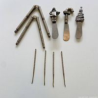 All items: two nutcrackers, four picks, three spreaders