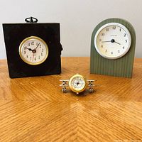 Front view of all three small clocks