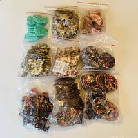 All nine bags of medallions laid out
