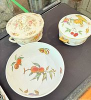 Royal Worcester Evesham Gold casserole with lid, open serving bowl, and W.H. Grindley covered bowl