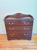 Full view of three-drawer chest front and sides