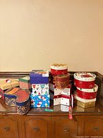 overview of assorted gift boxes on cabinet