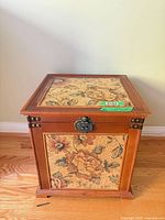 Large wooden box front and top panels with floral tapestry inset