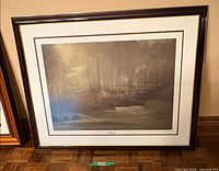 Full view of framed lithograph with frame and mat