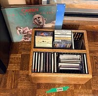 Overall lot showing Queen LP, mixed media and wood box