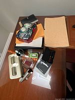 Wide shot of assorted office supplies on desk