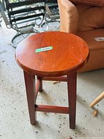 Full view of wooden round stool