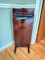 Full front view of Salton valet trousers press showing overall design and condition