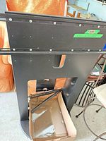 Front view of metal TV stand frame with mounting bracket