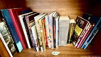 Full shelf showing all book spines