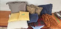 Group shot of all cushions and throws