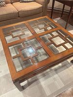 Top view showing wood grid design with four glass inserts