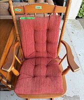 Front view of rocking chair with cushions