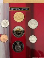 Front of folder showing all seven reverse designs