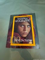 Front cover showing title and Afghan Girl cover image
