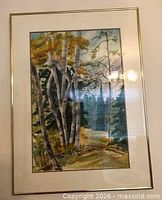 Forest landscape print in gold-tone frame