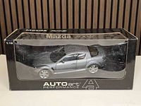 Model car in original AutoArt Performance window box