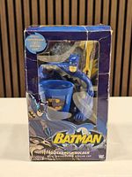 Front of boxed Batman toothbrush holder set