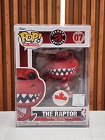 Front view boxed Funko Pop #07 The Raptor, showing figure and box details