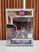 Front view of sealed Funko Pop #101 Isiah Thomas box