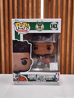 Front view of sealed Funko Pop! #143 Giannis Antetokounmpo box