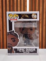 Front view of sealed Funko Pop Rocks #158 Tupac Shakur figure box