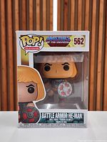 Front view of boxed Funko Pop #562 Battle Armor He-Man showing figure and packaging condition