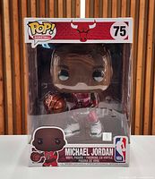 Front view of boxed giant Michael Jordan Funko Pop