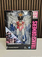 Front view of sealed Combiner Wars Starscream box
