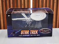 Front of sealed Hot Wheels box showing Star Trek U.S.S. Enterprise NCC-1701 Refit model