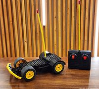 Overall view of LEGO RC car chassis and remote