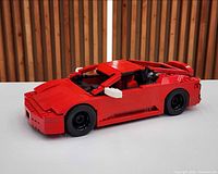 Left-front view of assembled red LEGO Ferrari F430 model