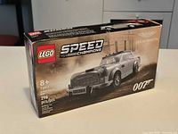 Front of LEGO Speed Champions Aston Martin DB5 box showing set number and piece count