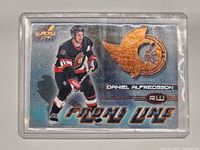 Front of Aurora Front Line Daniel Alfredsson card in sleeve