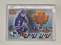 Front of Aurora Front Line Tie Domi card in sleeve