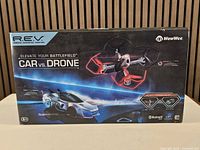 Front of sealed WowWee R.E.V. Car vs Drone set box