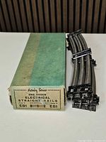 Hornby Series box labelled EB1 with stack of curved rails