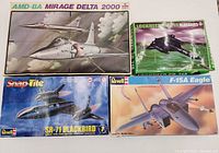 All four model kit boxes displayed front-on