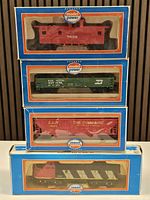 Stack of four Model Power HO scale boxed train items