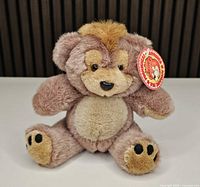 Front view of Punkinhead teddy bear showing tags and overall appearance