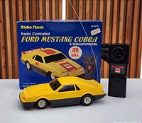 Box front, RC car front view, remote controller