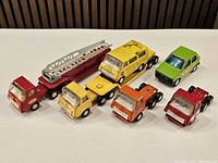 Group overview of all seven Tonka vehicles