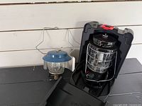 Coleman NorthStar lantern in case beside Bernzomatic Porta-Light