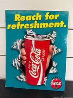 Front view of Coca-Cola display showing full graphic and text