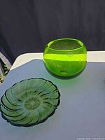 Lime green pressed glass fishbowl vase and swirl plate