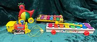 Group shot showing all four vintage toys