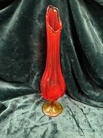 Full view of vase front showing color gradient and pedestal base