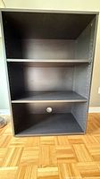 Front view showing entire bookcase and shelves